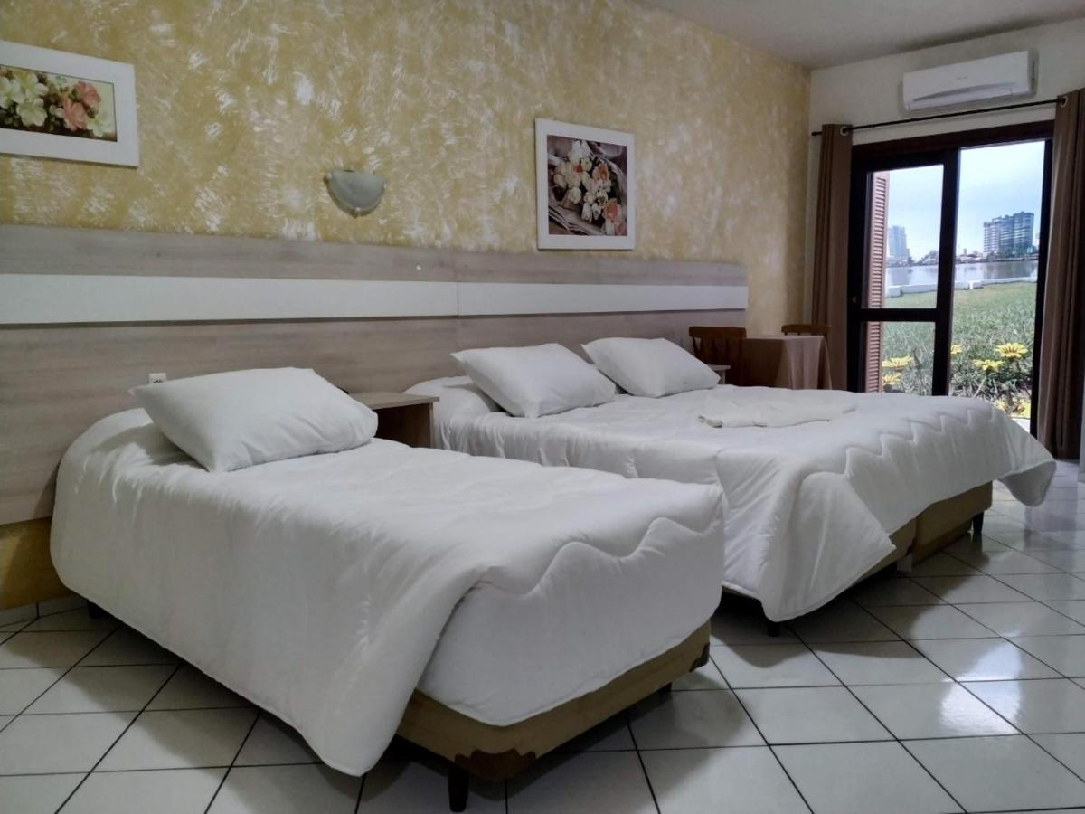 Hotel Mares Do Sul Tramandai Bagian luar foto